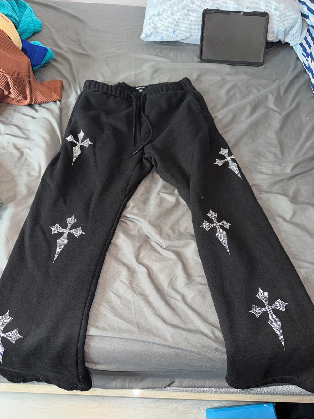 Fashion Nova Black Sweatpants with Silver Cross Graphics